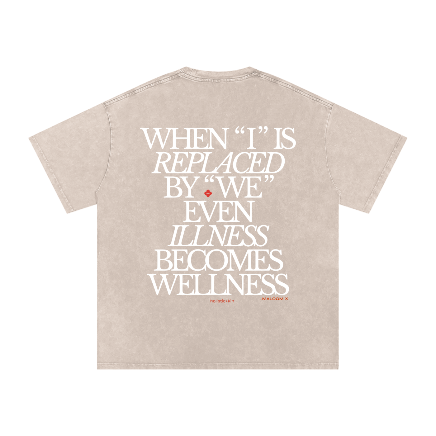 Apricot t-shirt with 'When I is replaced by We even illness becomes wellness', a Malcolm X quote, and the Holistic+Kin logo on a white background